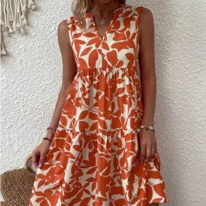 Blommig klänning knälång