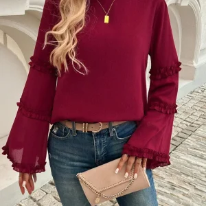 Blus med trumpetärm