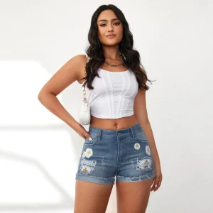 Broderade jeansshorts med blommor