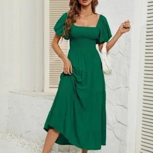 Klänning med smock i midjan