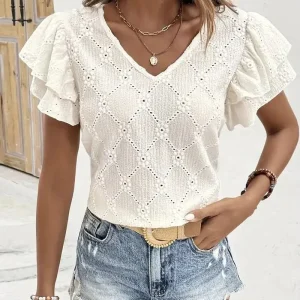 Vit blus med hålbroderi